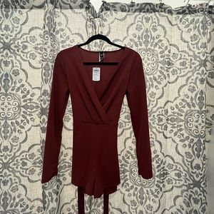 Burgundy jumpsuit with long sleeves